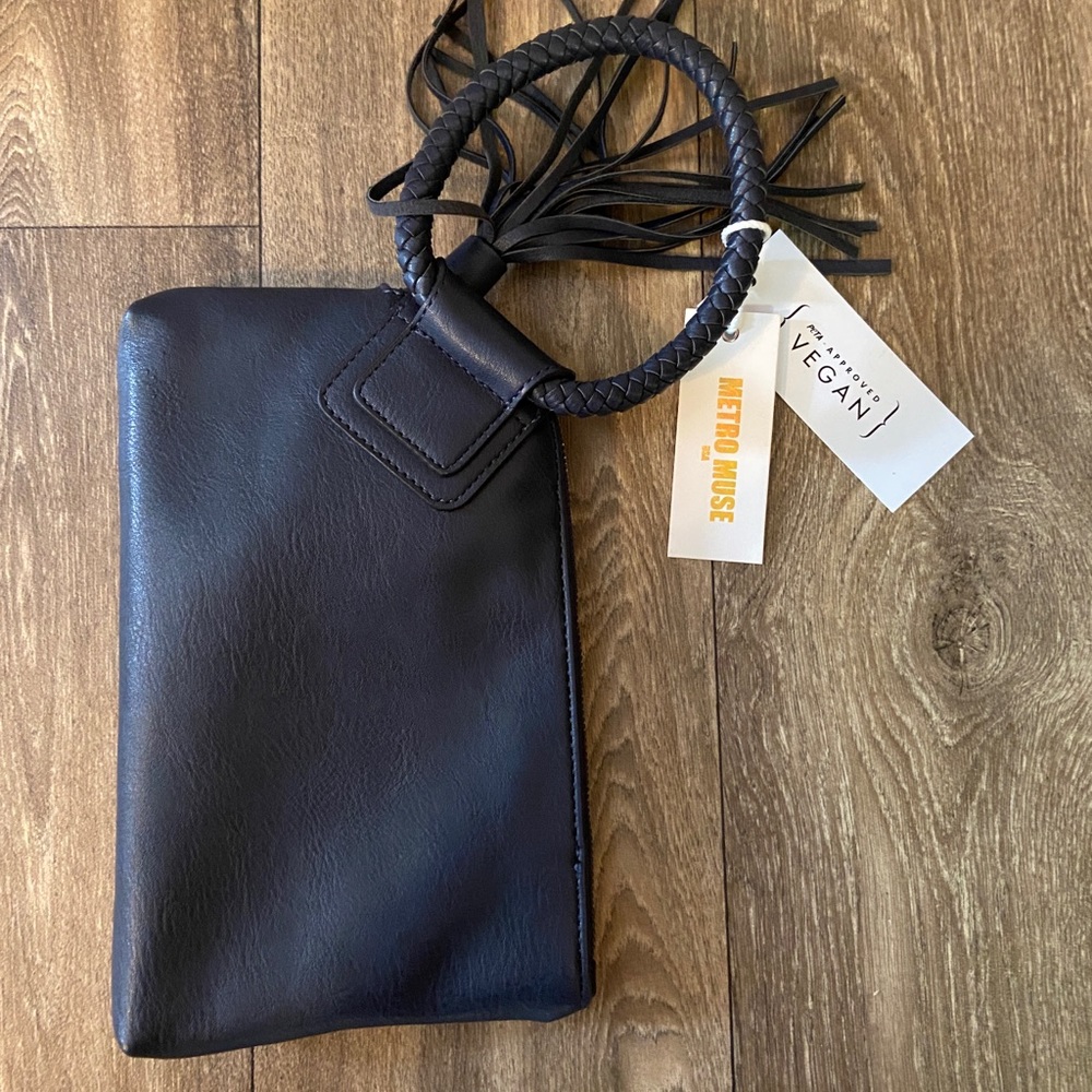 SOLD NWT Metro Muse navy faux leather clutch with tassel